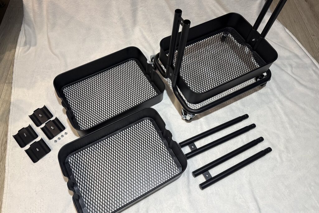 Disassembled IKEA RÅSKOG trolley showing the original parts and connection points.