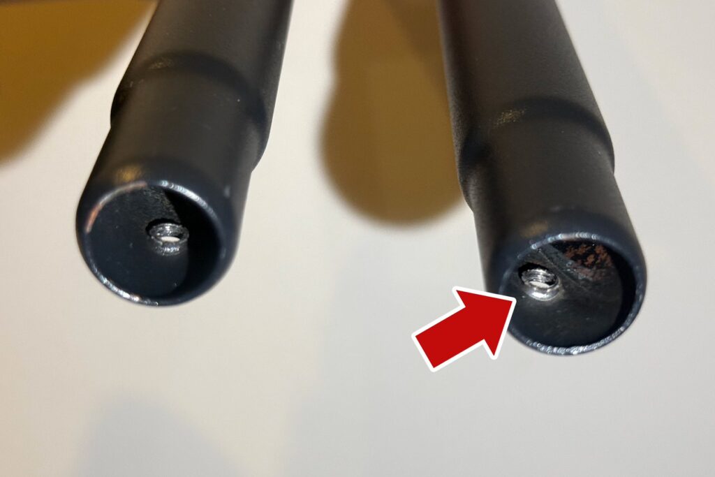 Close-up comparison of two RÅSKOG leg openings, with a small metal burr visible on one opening.