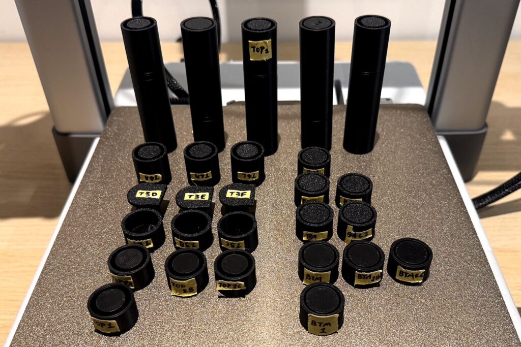 A collection of 3D-printed connector prototypes and fit-test pieces produced during the project.